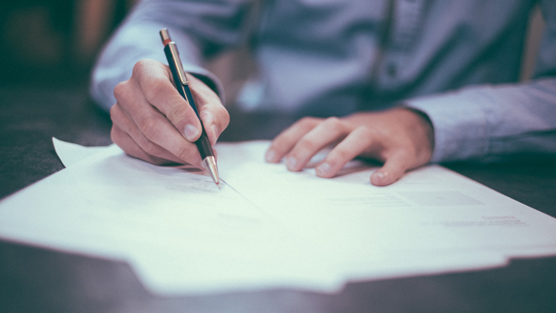 A Man Working on Civil Drafting Documentation