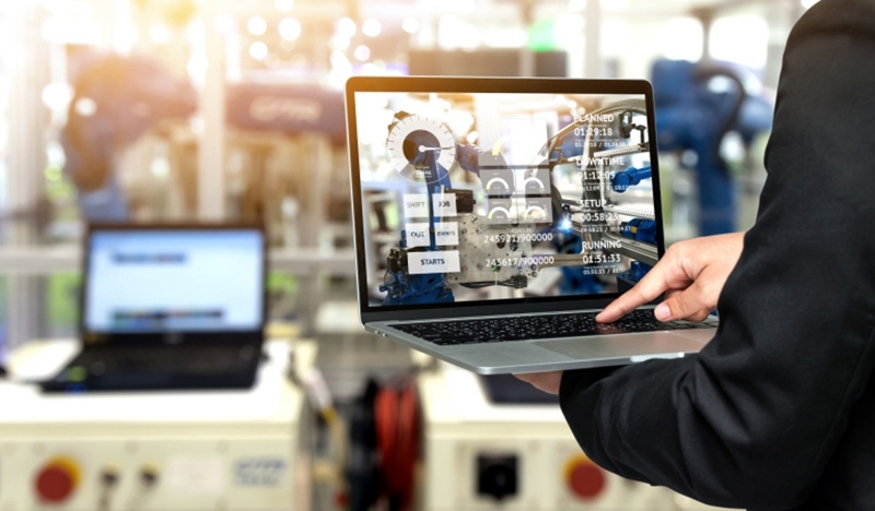 A Man Operating a 3D Printer Remotely