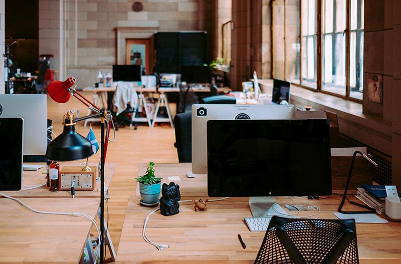 An Office with Workstations for Draftsmen